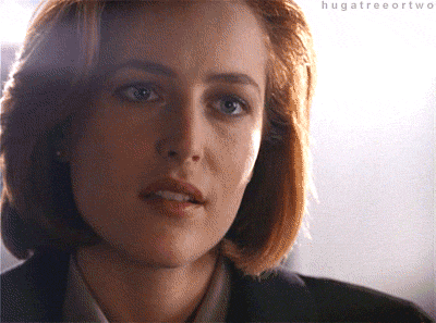 Scully says, "Yeah, right."